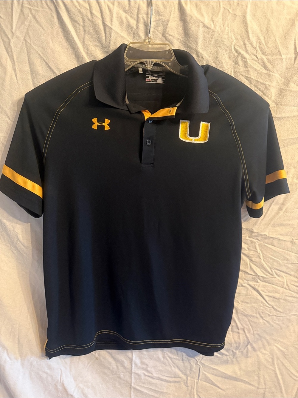 Under Armour Menโs Navy Polo with Gold Accents
